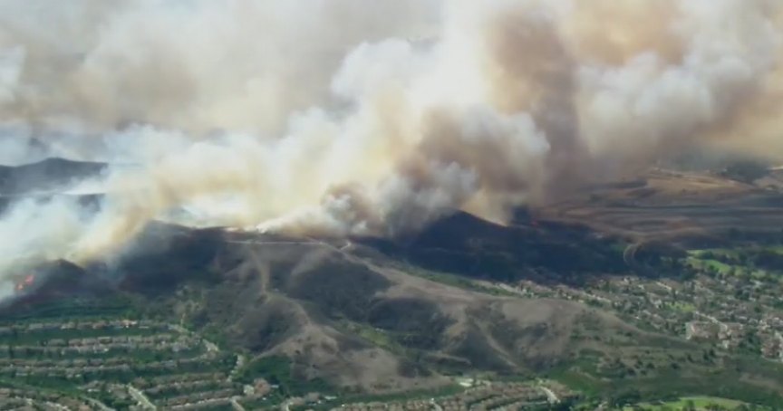 Smoke over hills during the Norte Fire