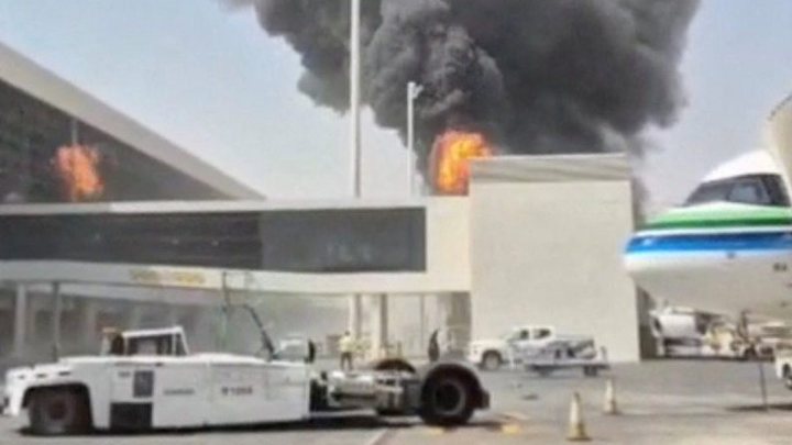 King Khalid International Airport, Riyadh: smoke after a Houthi missile strike