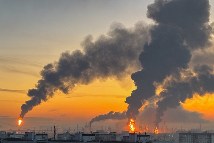 Smoke and flames rise from an oil refinery in Moscow after a drone strike
