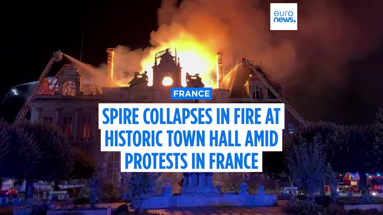 Limoges town hall in flames at night