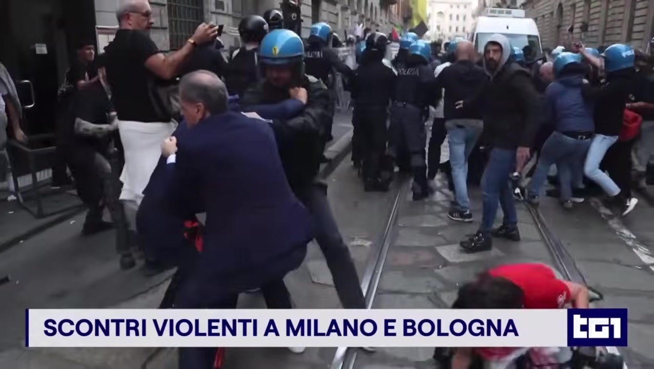 Police and protesters scuffle on a Milan street